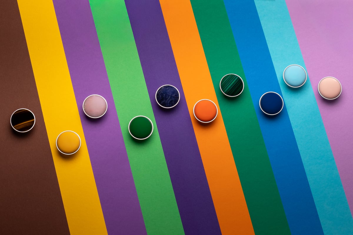 The ten pieces arranged across coloured backgrounds